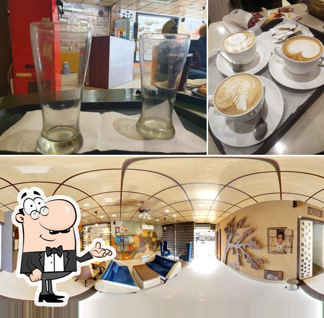 This is the photo depicting interior and beverage at Theka Coffee Desi