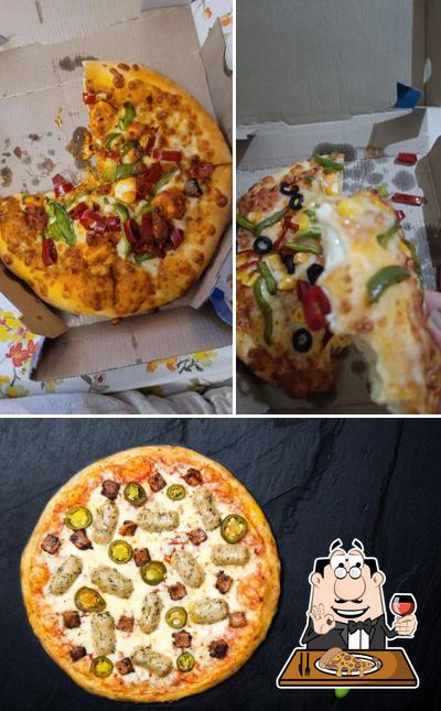 At Domino's Pizza Sector 70, Gurgaon, you can try pizza