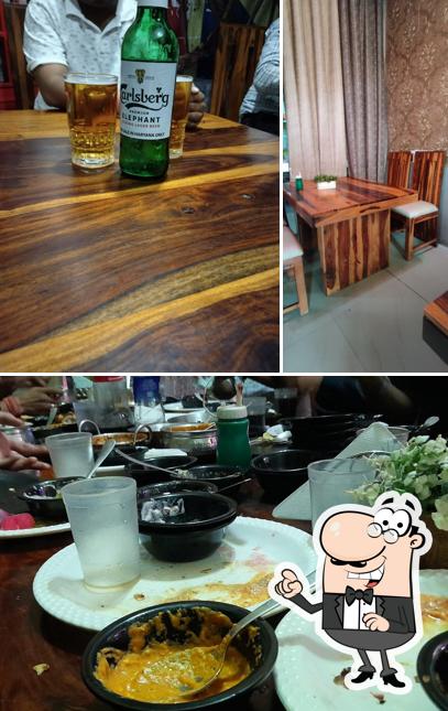 This is the image depicting interior and food at Sunset Desire (Sirsa)