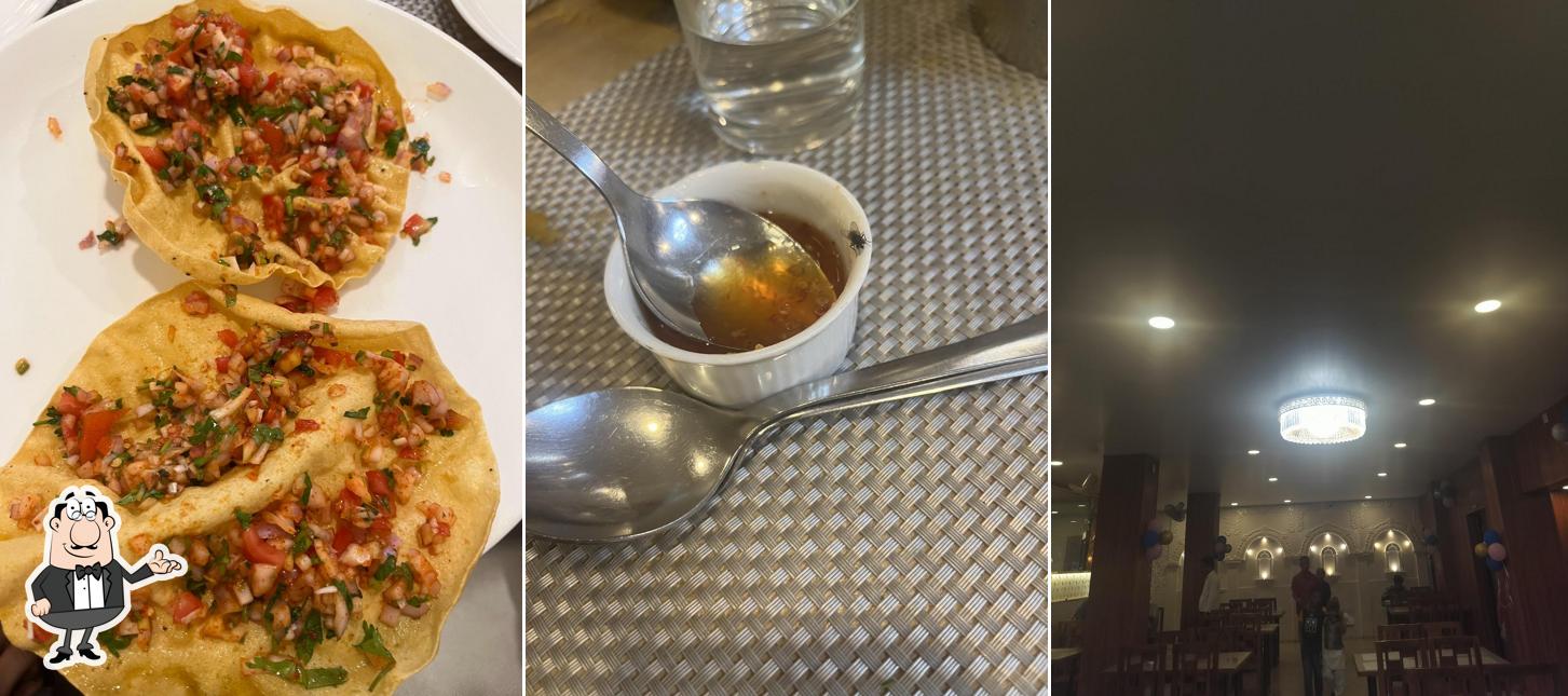 Take a seat at one of the tables at Mysore Durbar