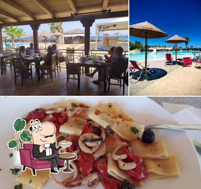 La immagine della interni e cibo di Ristorante Villaggio Punta Alice