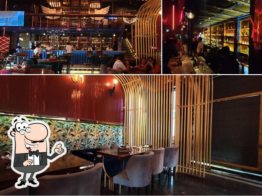 Among various things one can find interior and bar counter at The Spirits