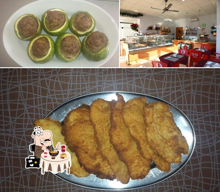 Tra le varie cose da Rimpizzatevi si possono trovare la cibo e interni