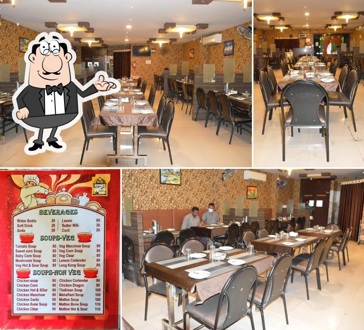 Take a seat at one of the tables at Suraksha's Biryani House