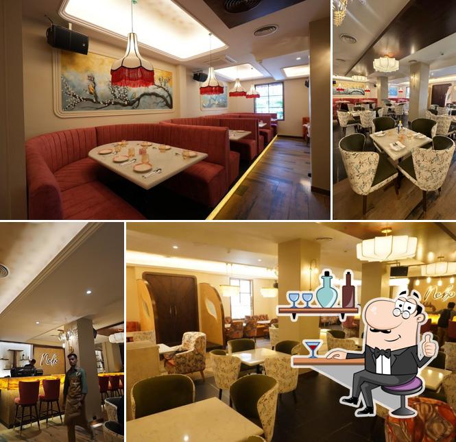 Take a seat at one of the tables at Nebo Fête House