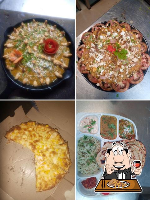 Get pizza at Oh Indore Restaurant and cafe