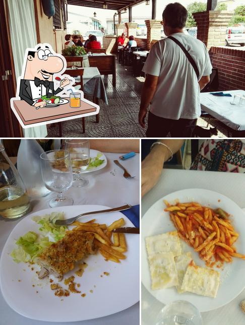 Questa è la immagine che mostra la cibo e interni di Il Covo Del Bucaniere