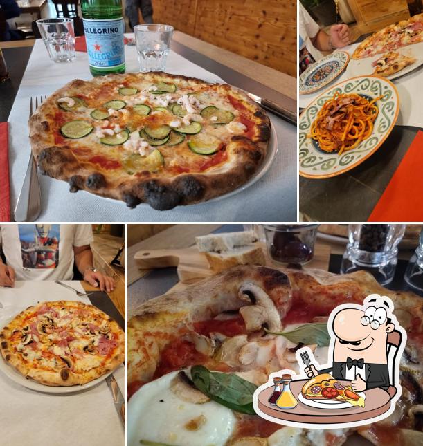 Prenditi una pizza a Pizzeria Ristorante Riccardo’s St.Moritz