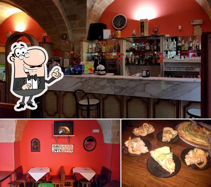 La immagine della interni e tavolo da pranzo di Bar Point Break