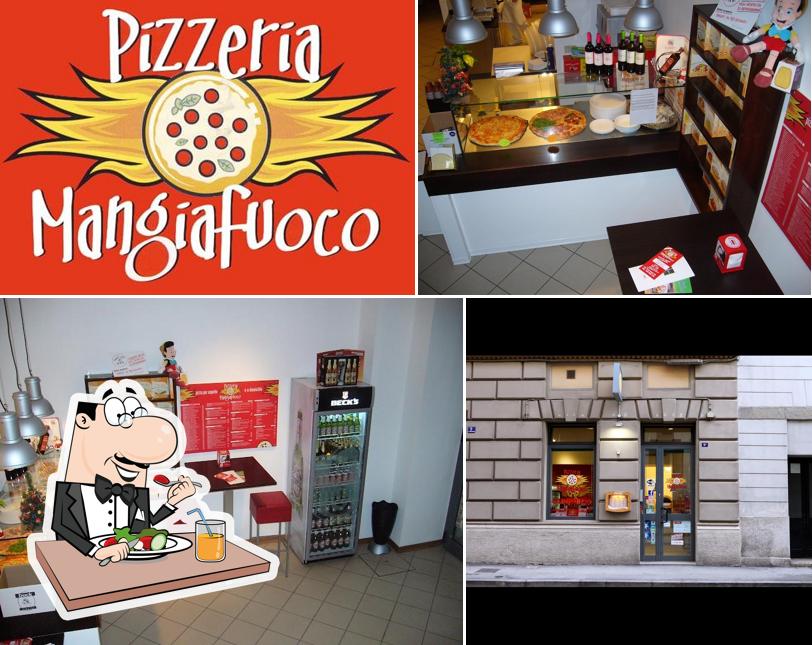 La foto della cibo e interni di Pizzeria Mangiafuoco