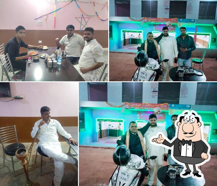 Take a seat at one of the tables at Pradhan ji dhaba and restaurant guest house