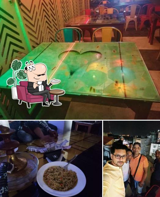 The image of interior and food at MudPipe Cafe (king of sheesha)