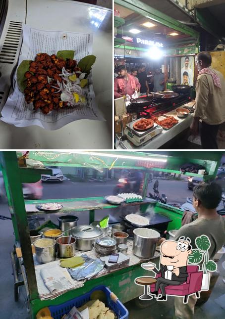 The image of interior and food at Bismillah Khan Chicken Pakodi