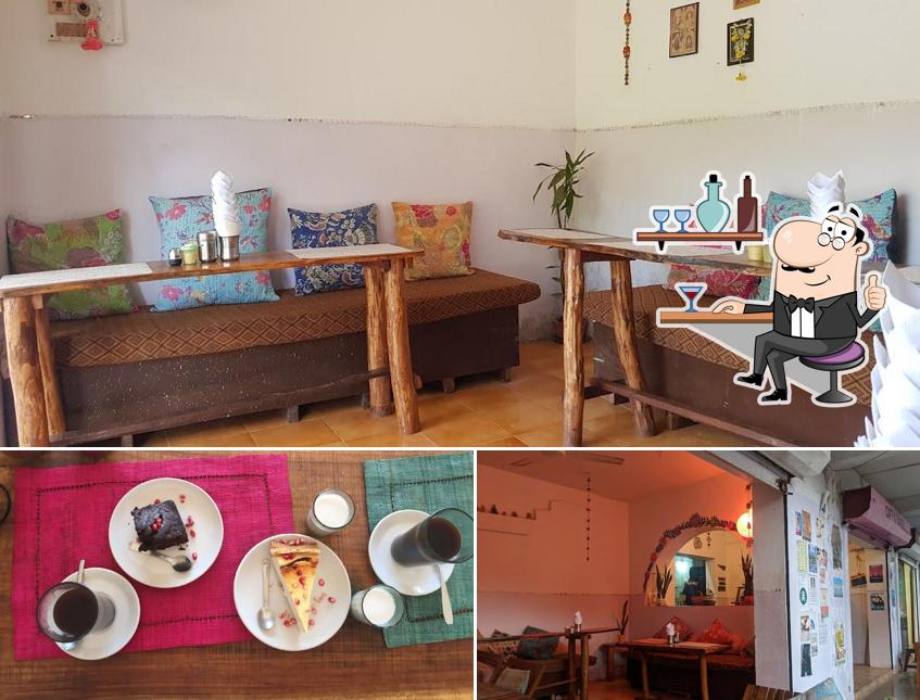 This is the image showing interior and food at Karma Cafe - Bakery