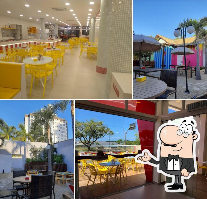 Sente em uma das mesas no Sorvetes Stringari Beira Rio