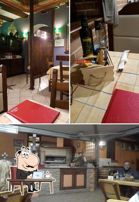 Siediti a un tavolo di Albergo Isonzo Pizzeria Tre Stelle