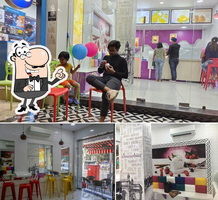 Take a seat at one of the tables at Snow Bite Natural Ice Cream