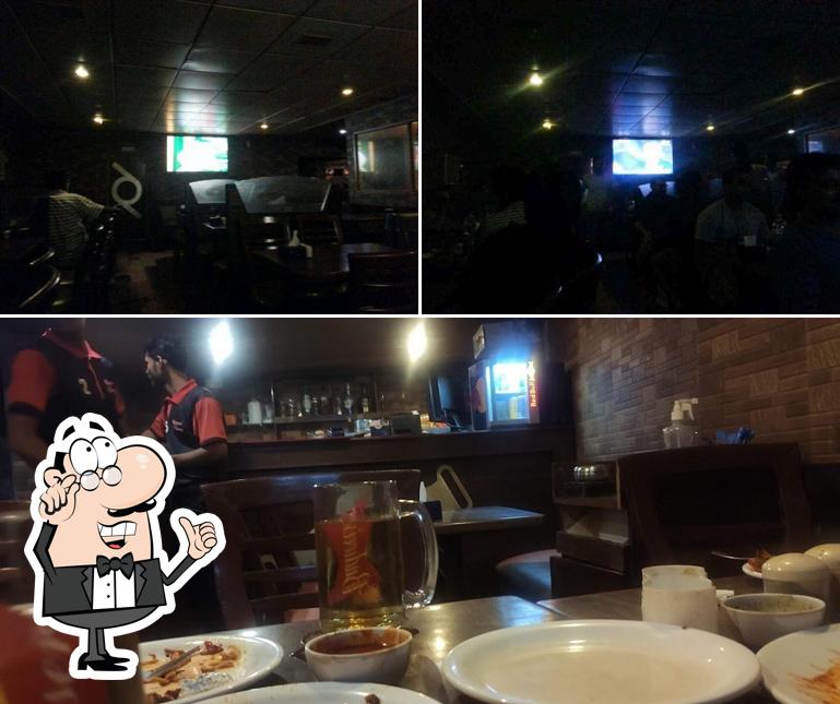 The picture of interior and dining table at Kamal Chhaya Bar And Restaurant