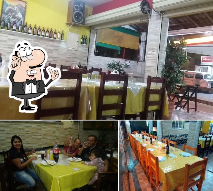 Veja imagens do interior do Pizzaria Mundial