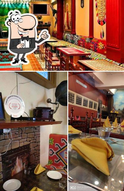 Take a seat at one of the tables at Laat Saab