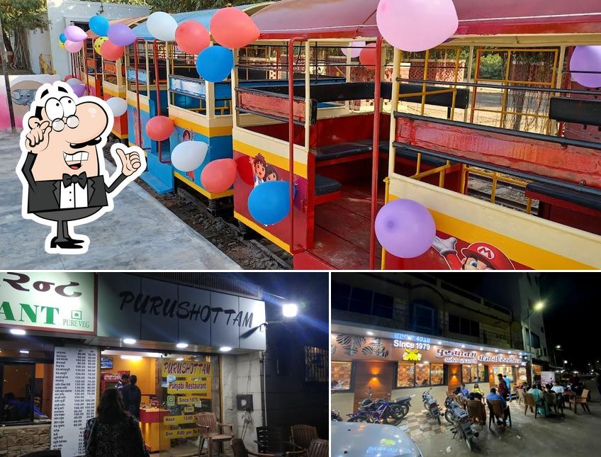 The photo of interior and play area at Purushottam Parotha House and Punjabi Restaurant