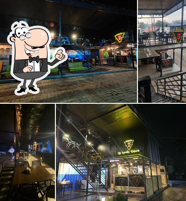 Take a seat at one of the tables at Al Taza - Kalamassery