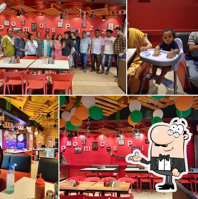 The interior of Pomo's Pizza Ankleshwar
