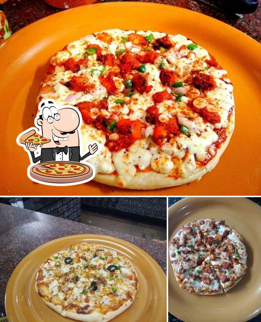 Try out pizza at Coastal Cafe