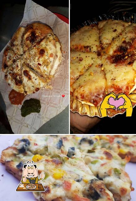 Try out pizza at Bliss Veg Resto