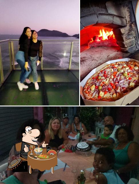 Esta é a foto mostrando comida e bebida no Pizzaria Forno Quente