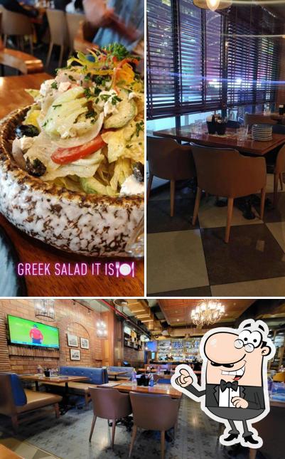 Take a seat at one of the tables at United Coffee House Rewind