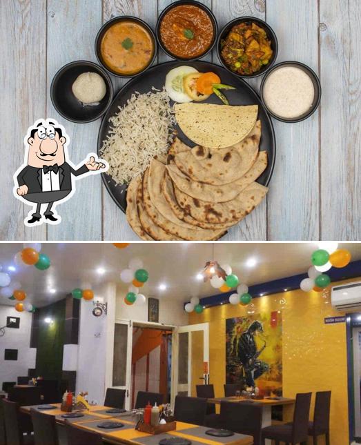 Take a seat at one of the tables at Sita Rasoi - A Unit Of Mint Leaf