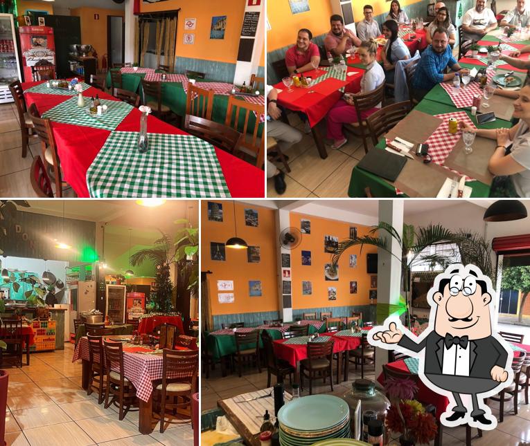 Sente em uma das mesas no Don Piccolo Bistro