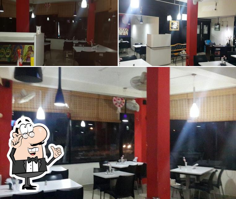 Take a seat at one of the tables at The Food Club