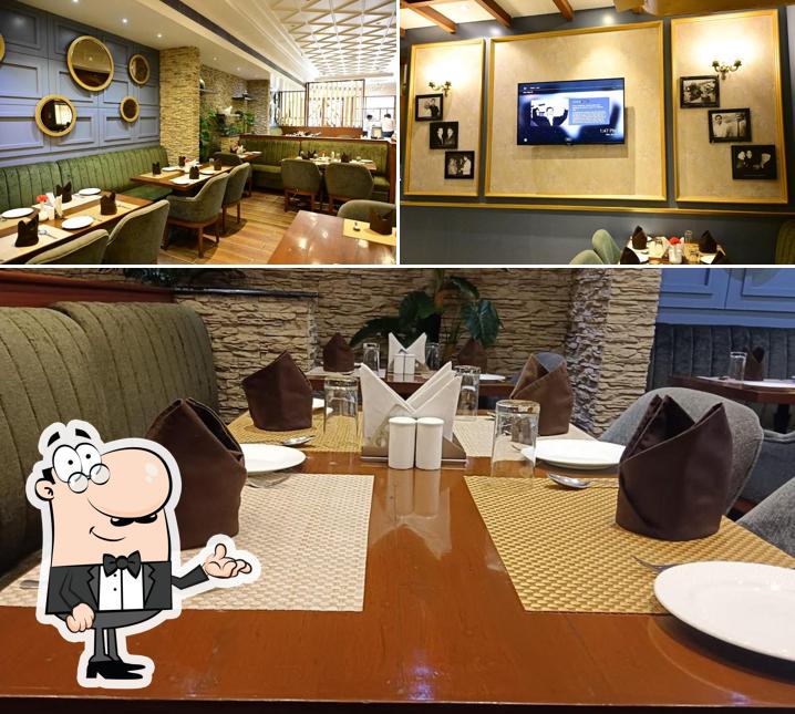 Take a seat at one of the tables at Jackson Dinner ( By Moti Mahal of India ) - Best Restaurant in Lalpur Ranchi