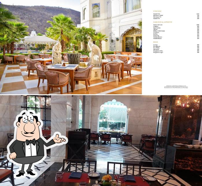 Take a seat at one of the tables at The Leela Palace Jaipur