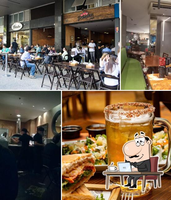 Sente em uma das mesas no Pomodori Pizza