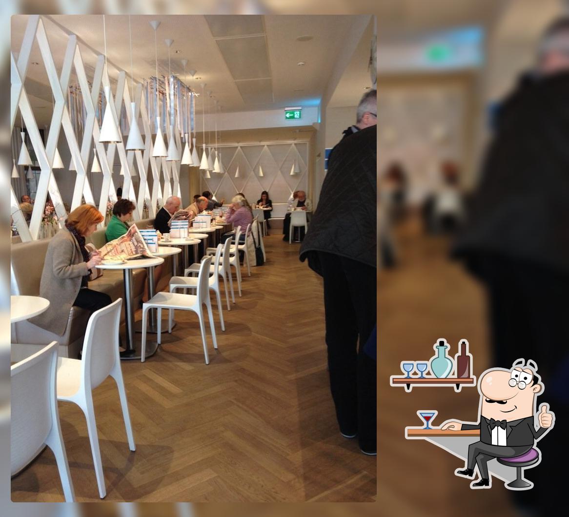 Siediti a un tavolo di Heini