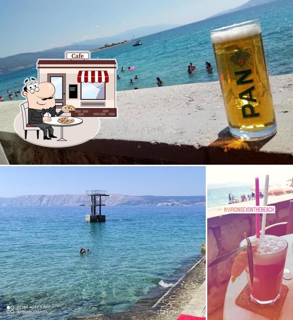 Questa è la foto che raffigura la esterno e alcol di Hula Beach bar