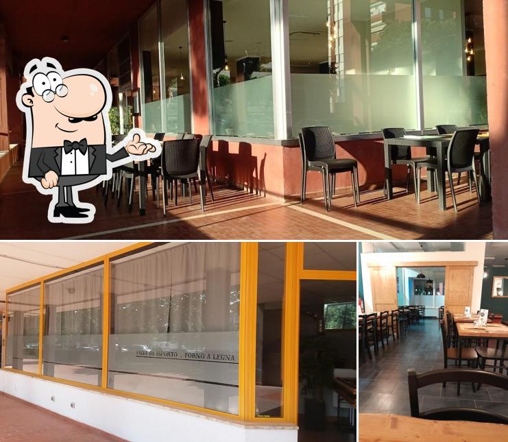 Dai un'occhiata agli interni di Pizzeria Aió