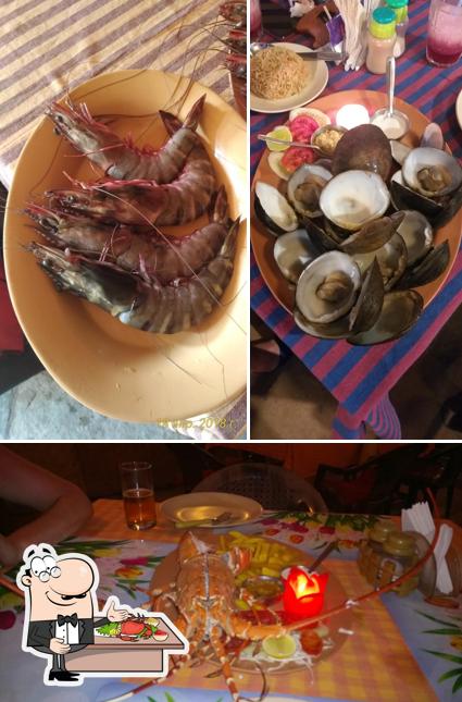 Try out seafood at Harry's Bar & Restaurant