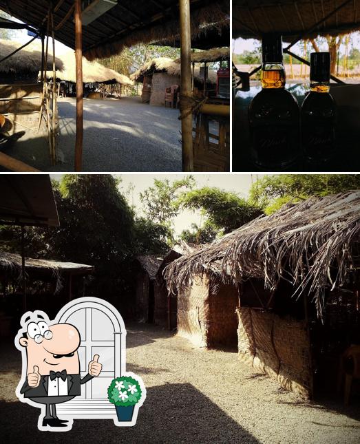 The photo of Hotel Madhuban’s exterior and beer