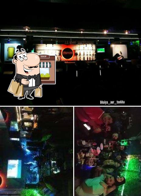 The exterior of Opium Bar By The Roof