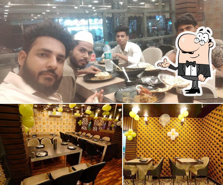 Take a seat at one of the tables at kohinoor restaurant