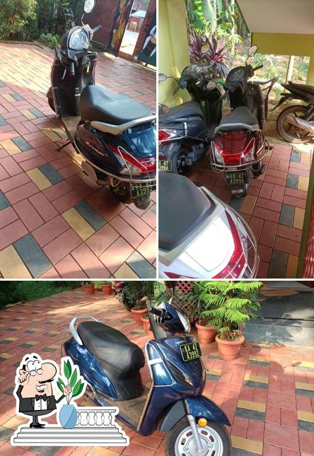 Enjoy the view at the outside area of Mahesh's cafe and bike rentals