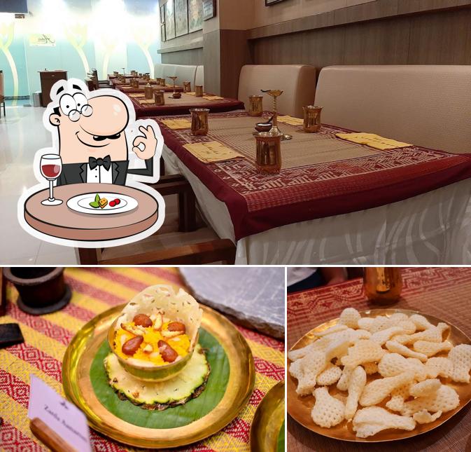 Check out the image displaying food and interior at Aaheli - Authentic Bengali Food Restaurant