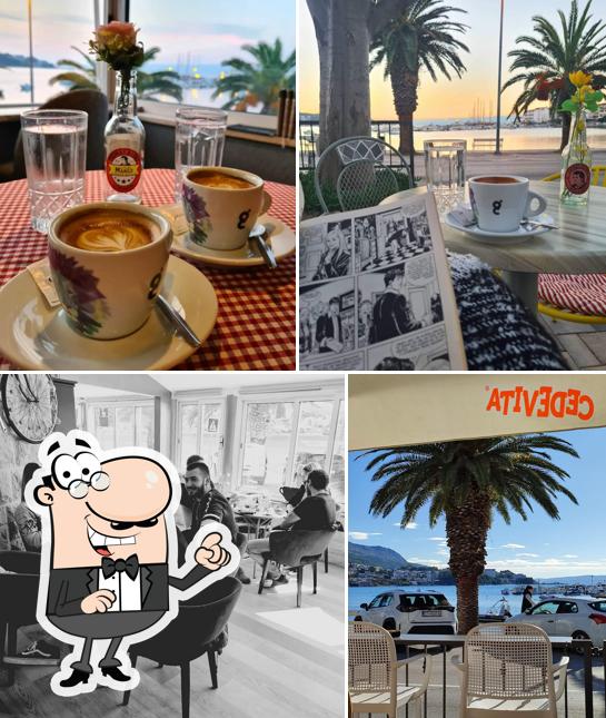 Dai un'occhiata agli interni di Cafe Porco Rosso