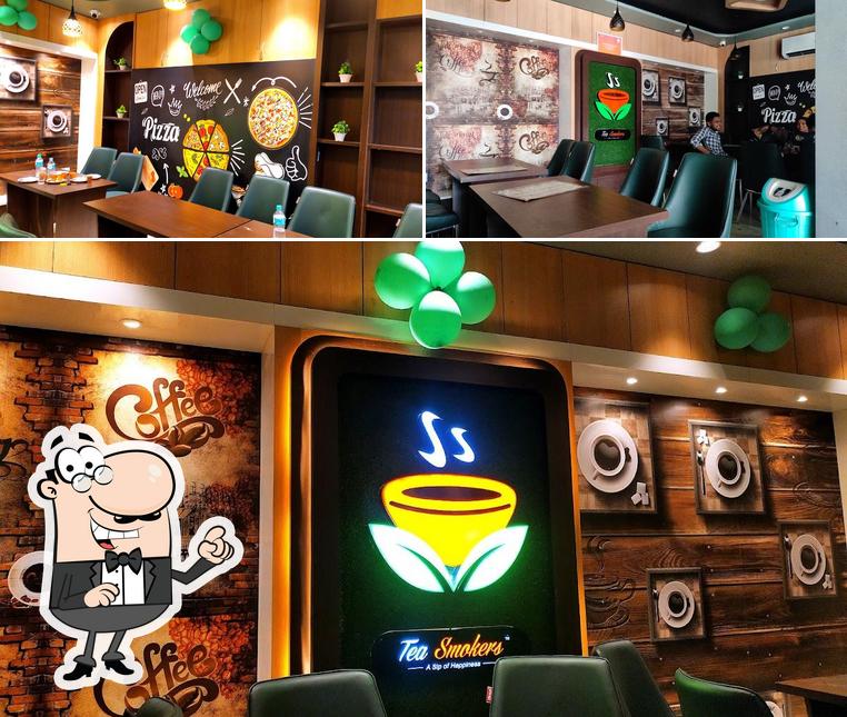 Take a seat at one of the tables at Tea smokers cafe