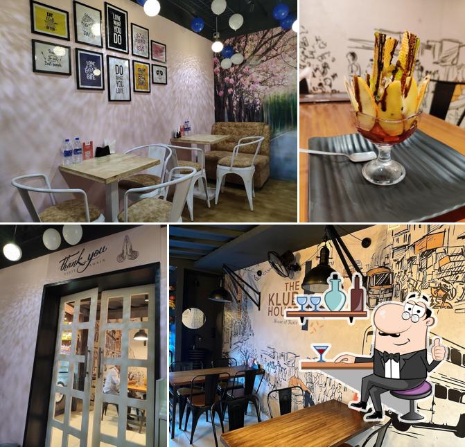 Take a seat at one of the tables at The Klub House