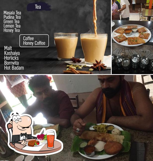 Check out the photo showing dining table and beverage at Hotel Krishna Sagar